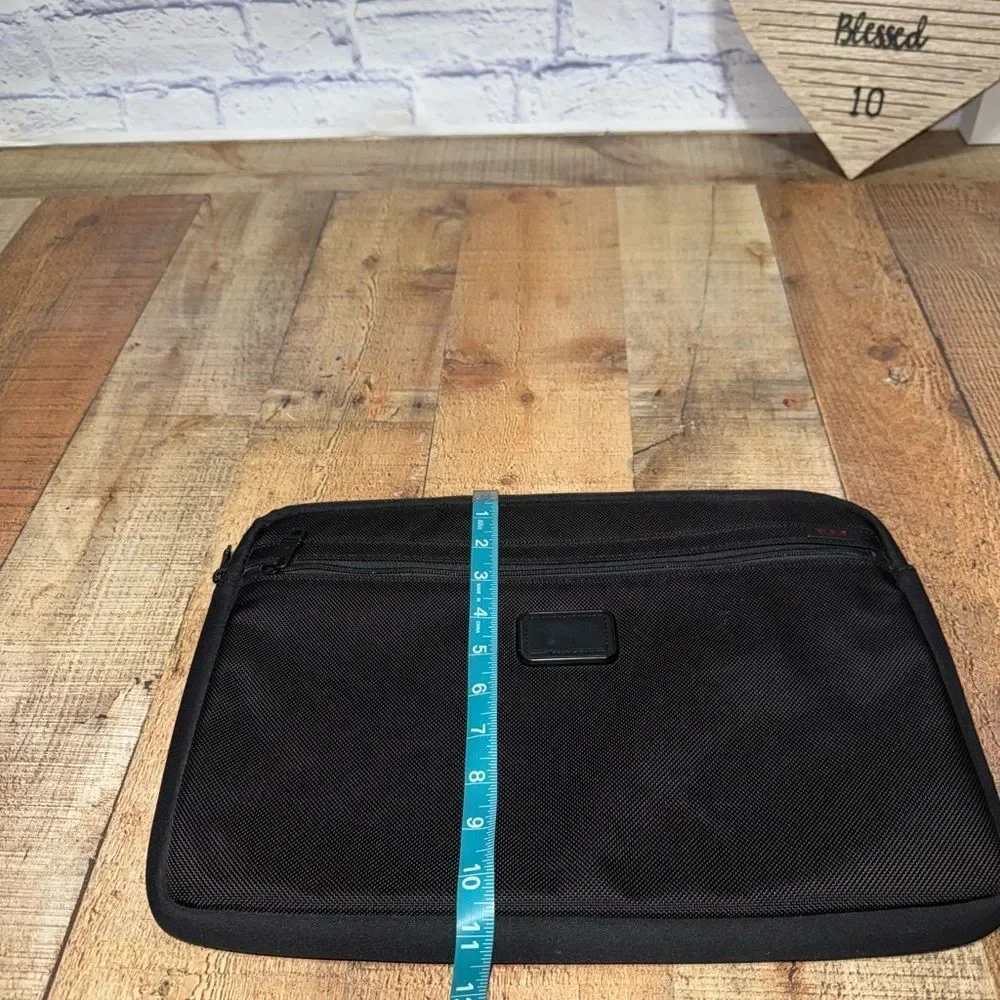 Tumi black laptop